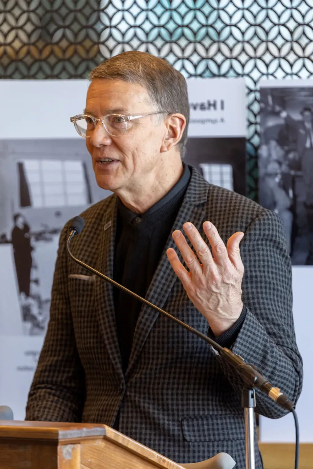 UNE President James Herbert speaks at the podium